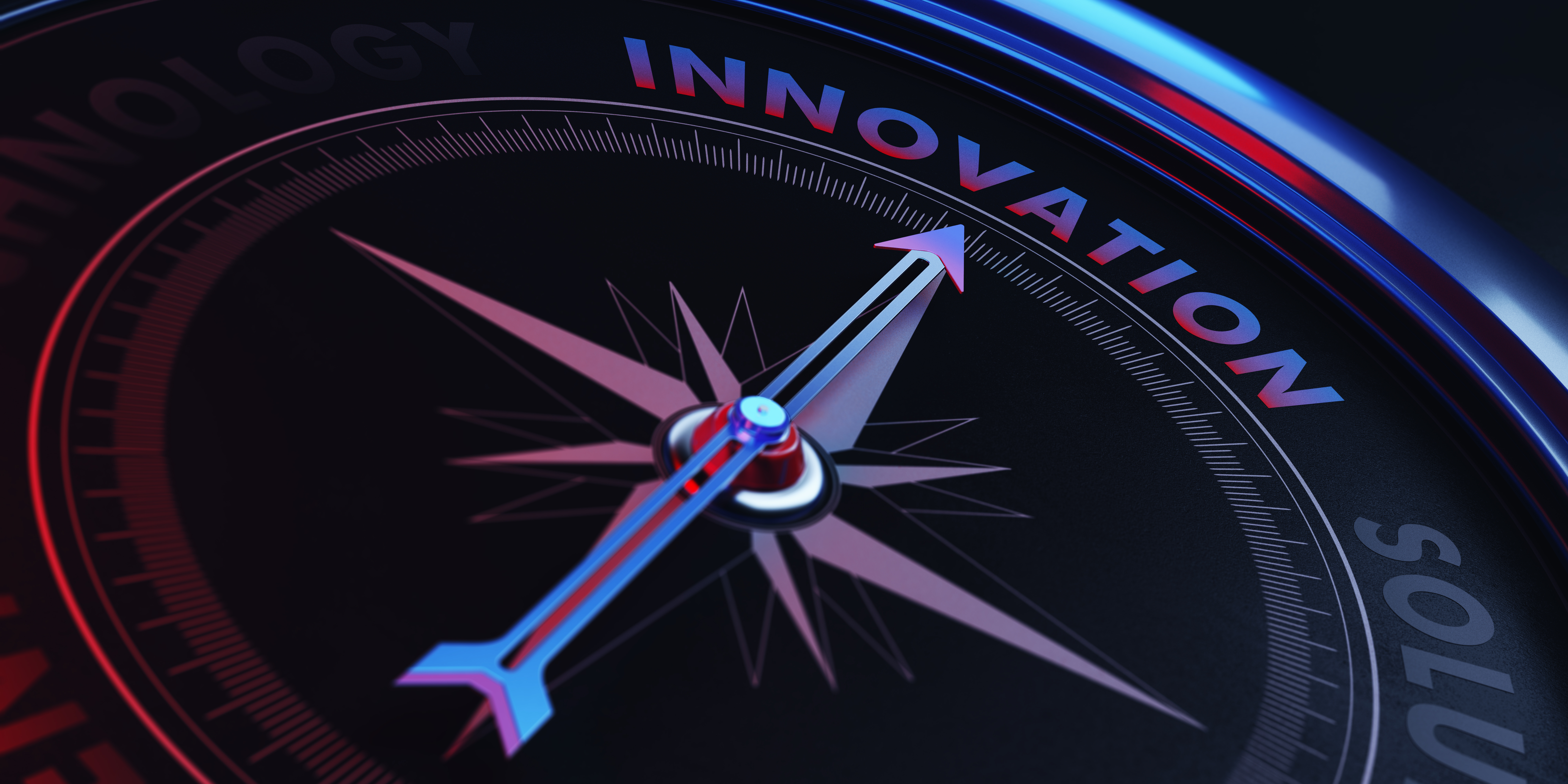 kompas wskazujący na napis innowacje